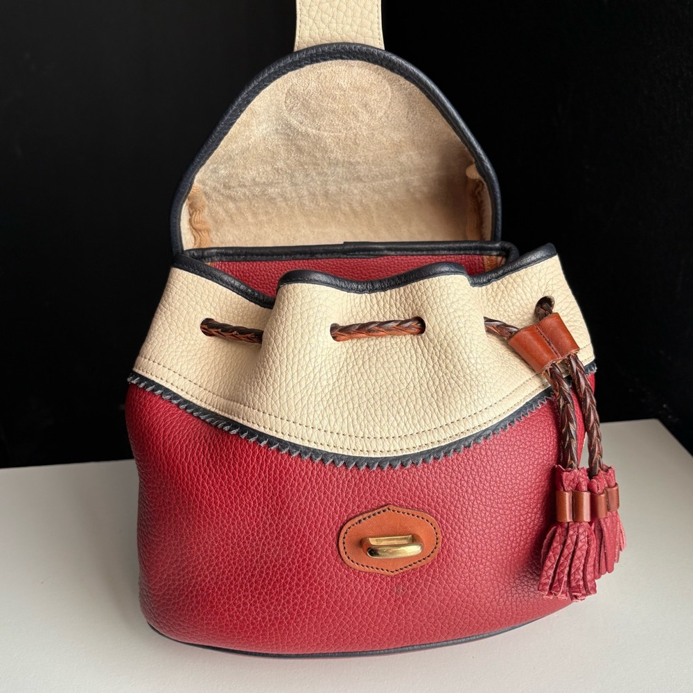 Dooney and Bourke awl leather Teton Drawstring Bag
Rouge Bone Navy - Picture 13 of 16
